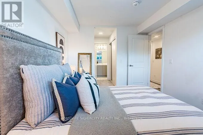 104 - 3058 SIXTH LINE