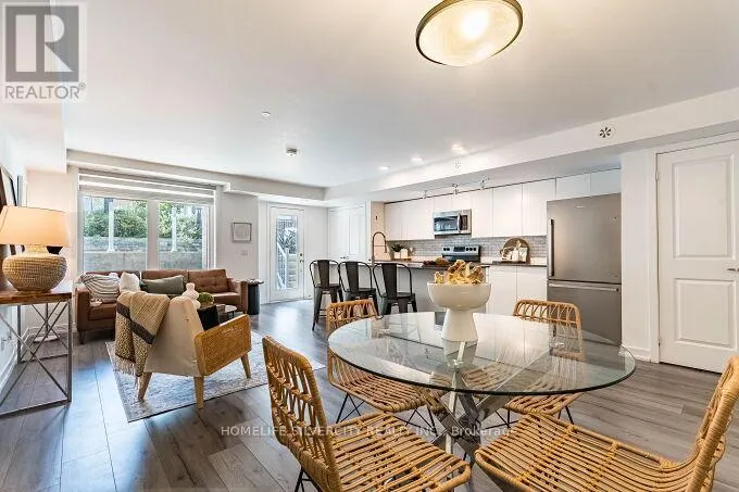 104 - 3058 SIXTH LINE