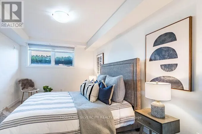 104 - 3058 SIXTH LINE