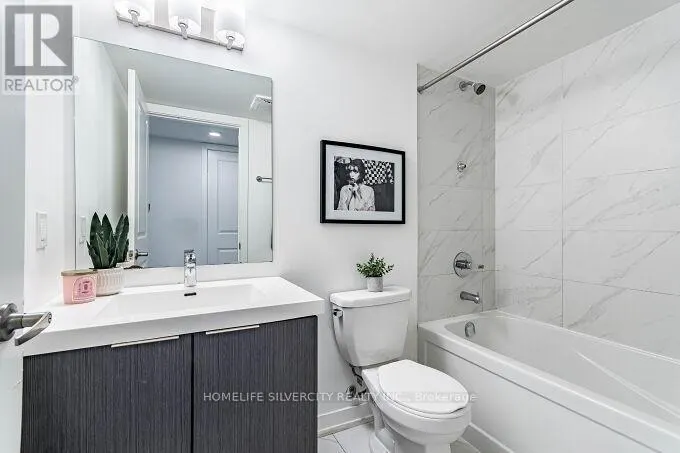 104 - 3058 SIXTH LINE