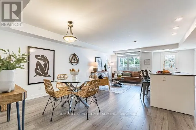 104 - 3058 SIXTH LINE