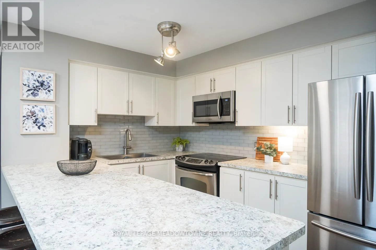 302 - 1701 LAMPMAN AVENUE