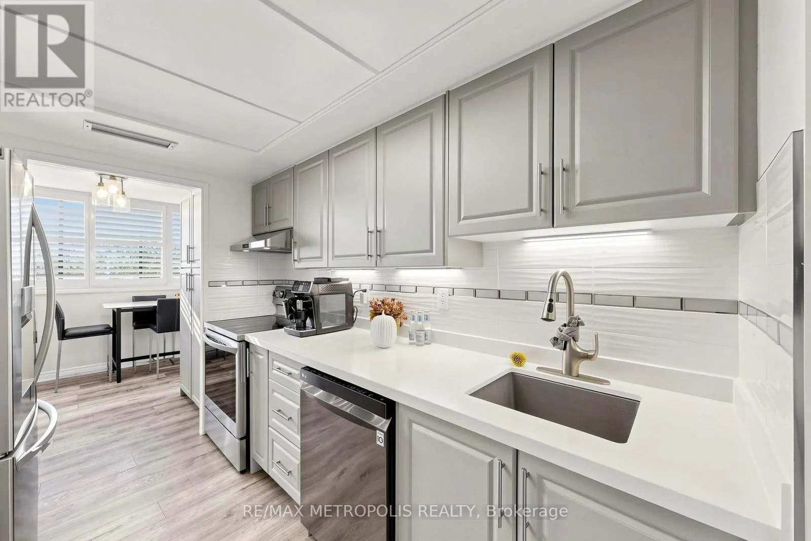207 - 1111 BOUGH BEECHES BOULEVARD