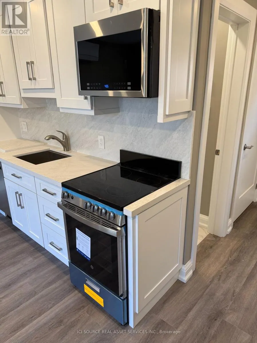 COACH HOUSE APT - 247 ROXTON ROAD