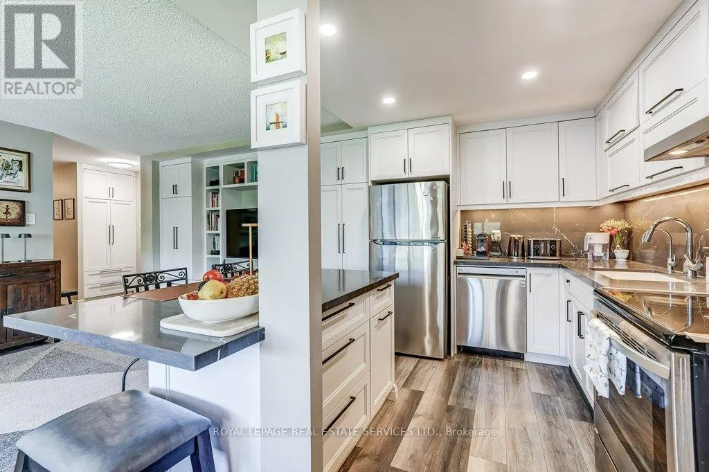 402 - 3590 KANEFF CRESCENT