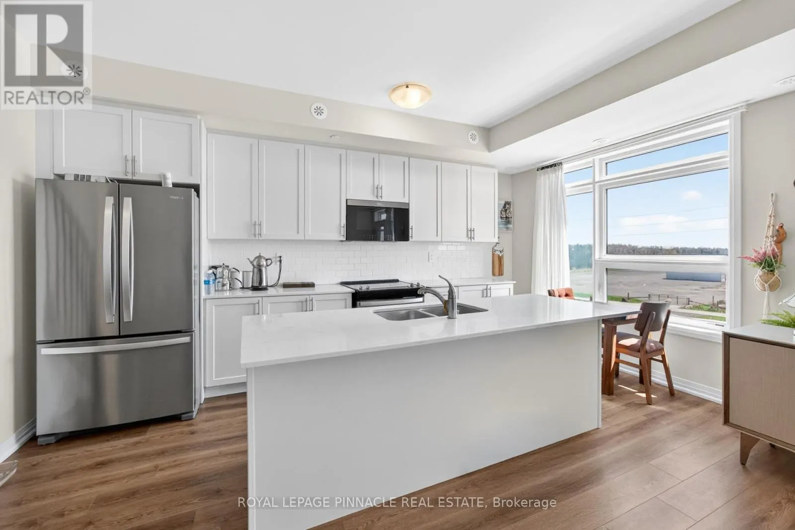 103 - 1585 ROSE WAY