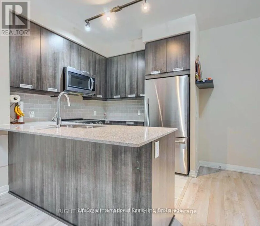 201 - 65 WATERGARDEN DRIVE #201