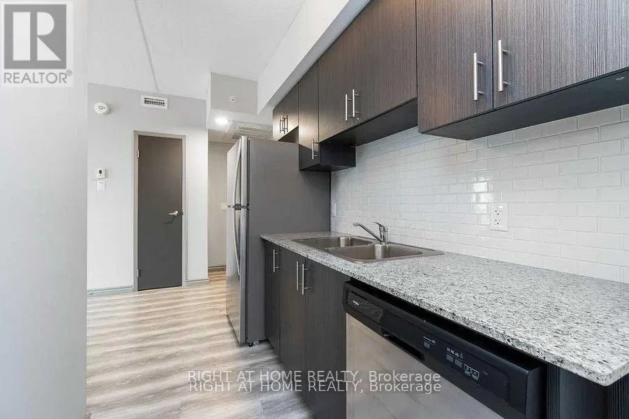 F114 - 275 LARCH STREET S