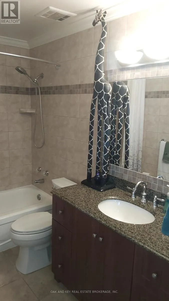 703 - 75 HUXLEY STREET, #703