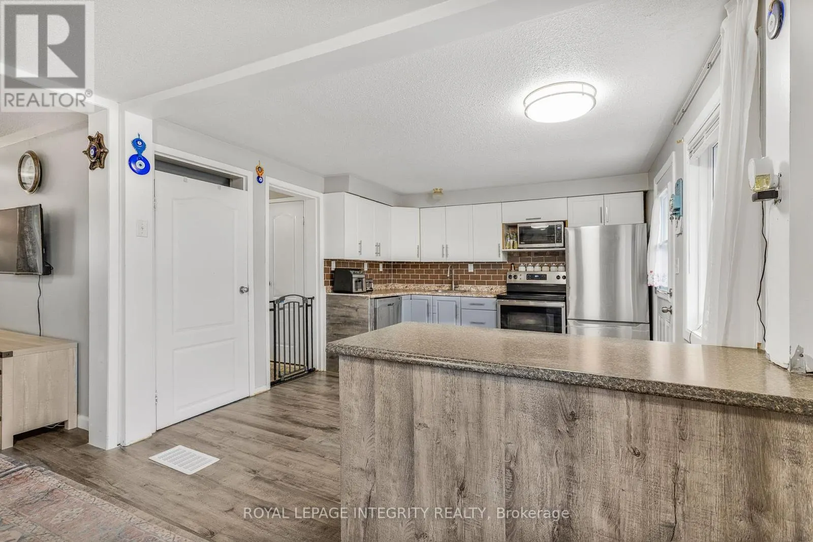 107 - 1548 BEAVERPOND DRIVE