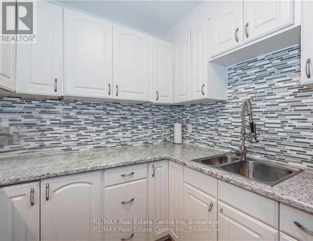 310 - 65 SILVERCREEK PARKWAY N, #310