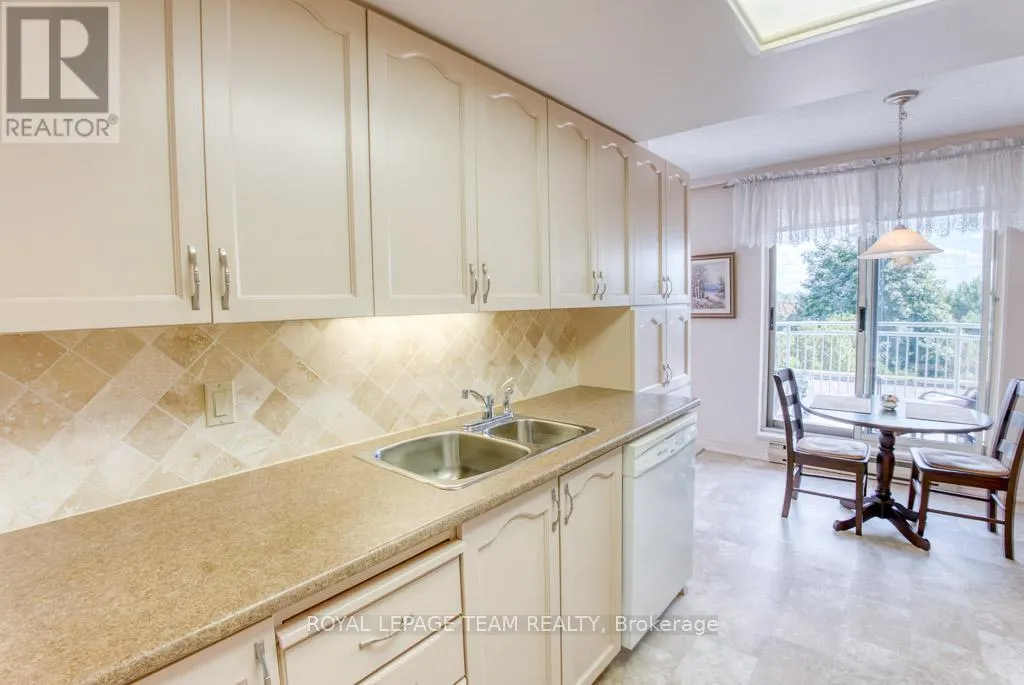 306 - 100 GRANT CARMAN DRIVE