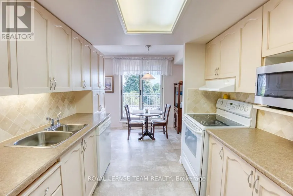 306 - 100 GRANT CARMAN DRIVE