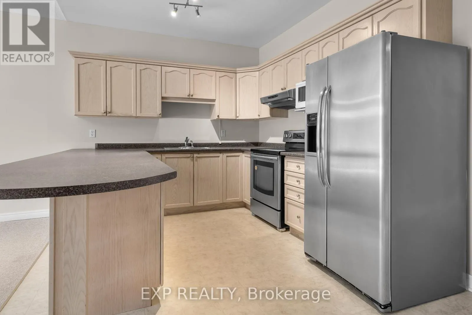 23 - 5595 DRUMMOND ROAD, #23