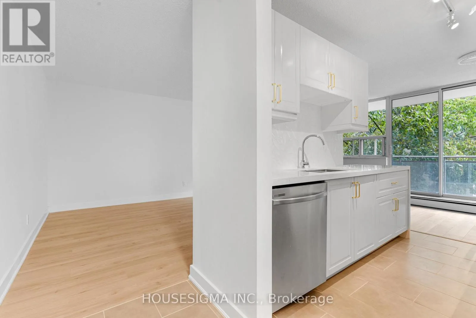 305 - 6400 HUGGINS STREET