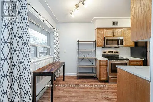 203 - 11 WOODMAN DRIVE S