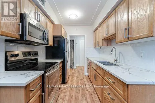 203 - 11 WOODMAN DRIVE S
