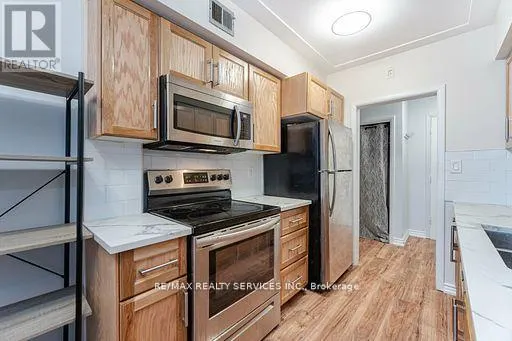 203 - 11 WOODMAN DRIVE S