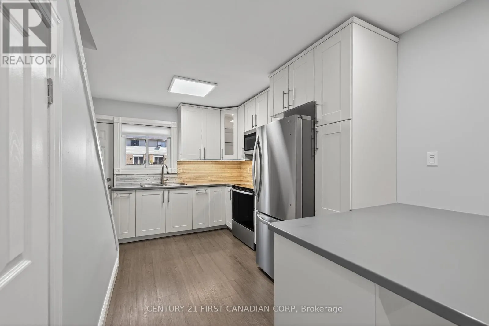 102 - 1090 KIPPS LANE, #102