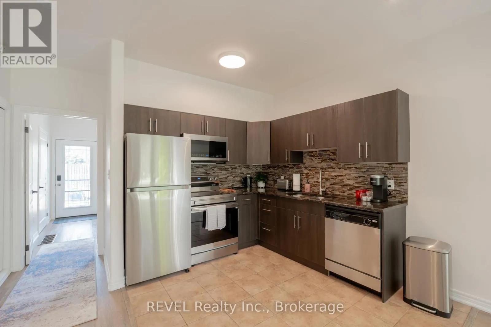 104 - 6045 DUNN STREET, #104