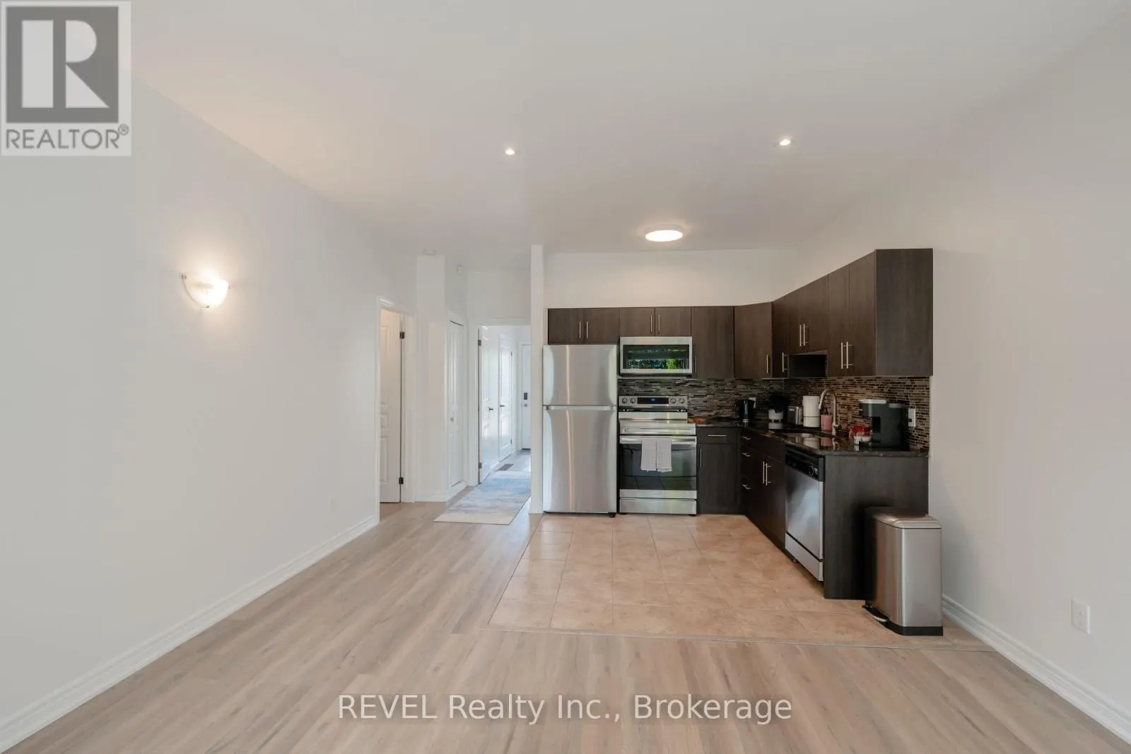 104 - 6045 DUNN STREET, #104