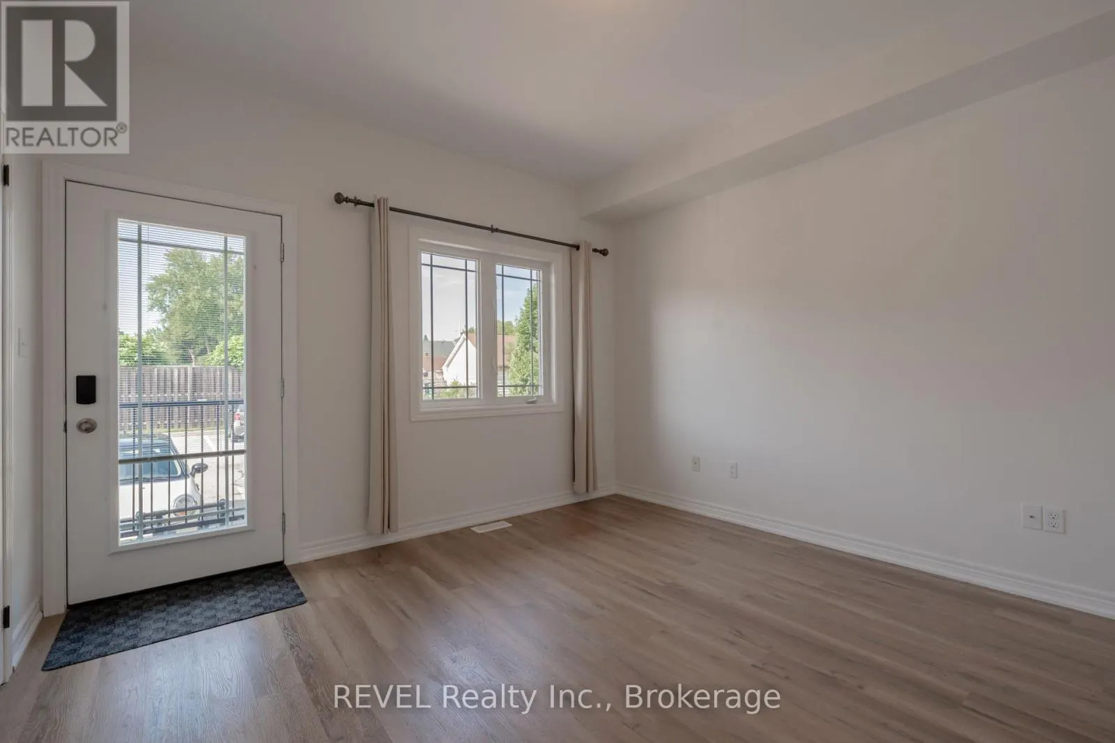 104 - 6045 DUNN STREET, #104