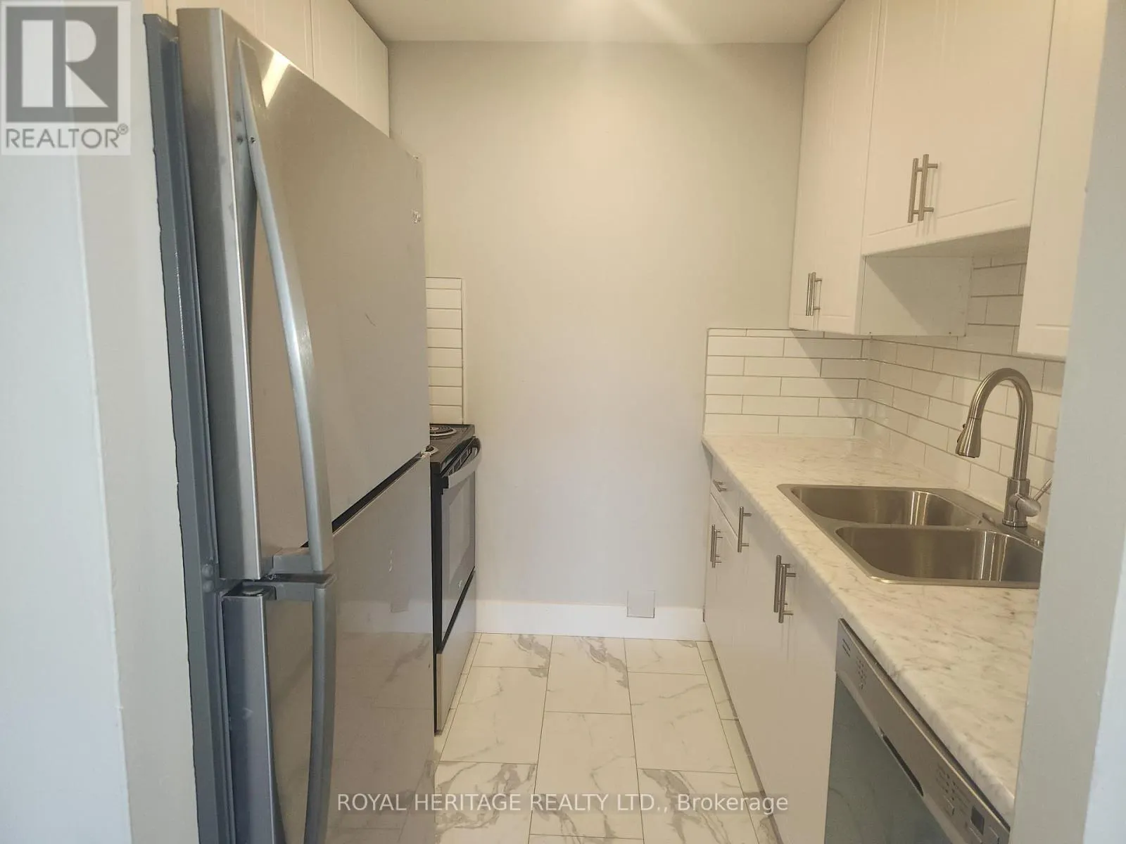 202 - 8800 WILLOUGHBY DRIVE