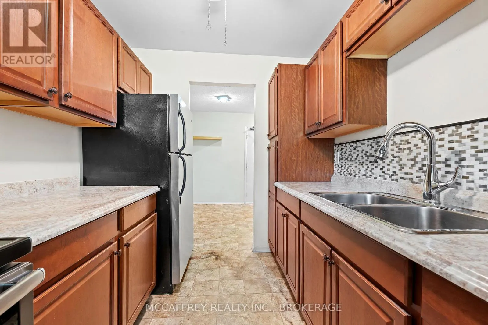 102 - 1010 PEMBRIDGE CRESCENT, #102