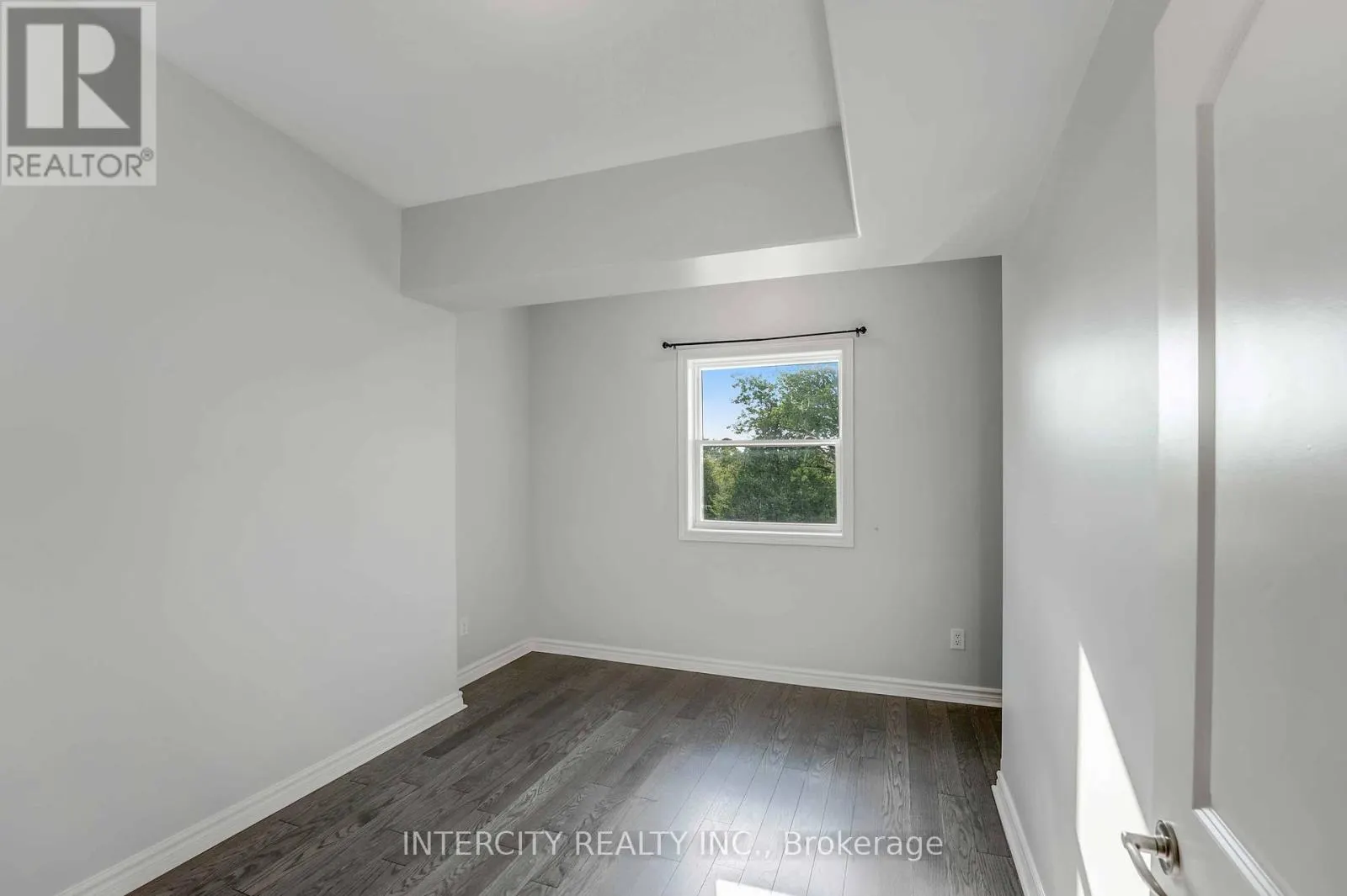 306 - 6928 AILANTHUS AVENUE E