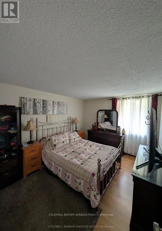 104 - 1171 AMBLESIDE DRIVE N
