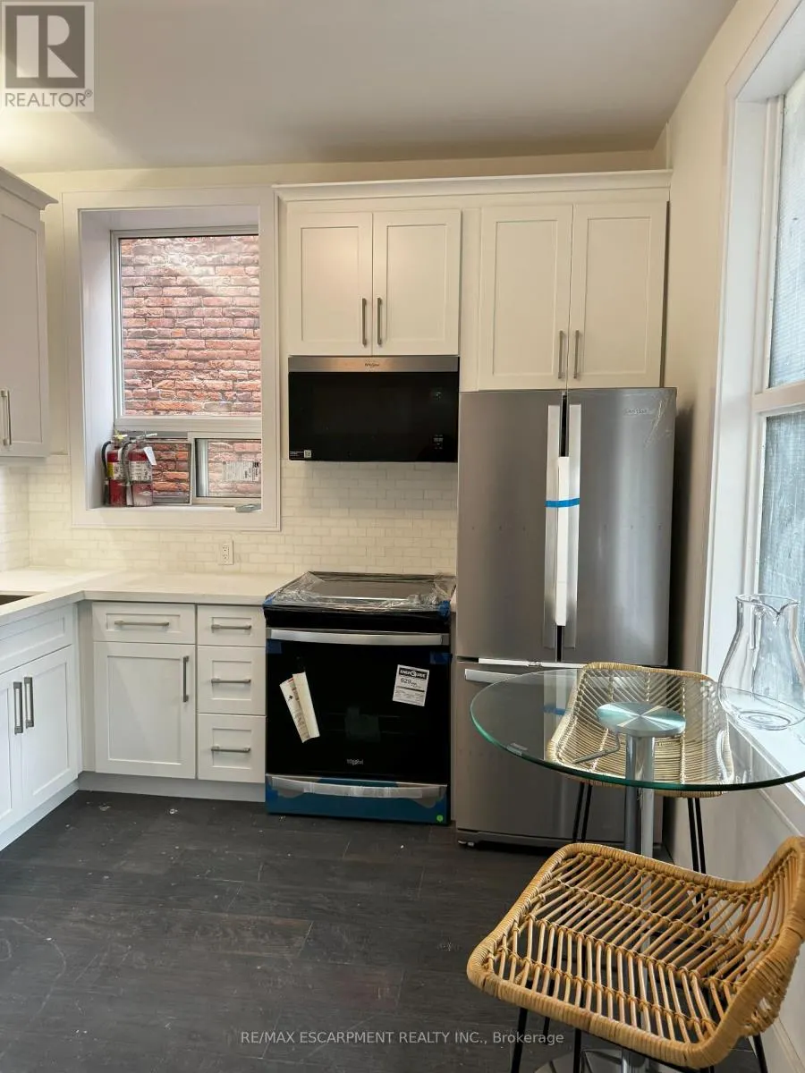 8 - 307 1/2 BARTON STREET E