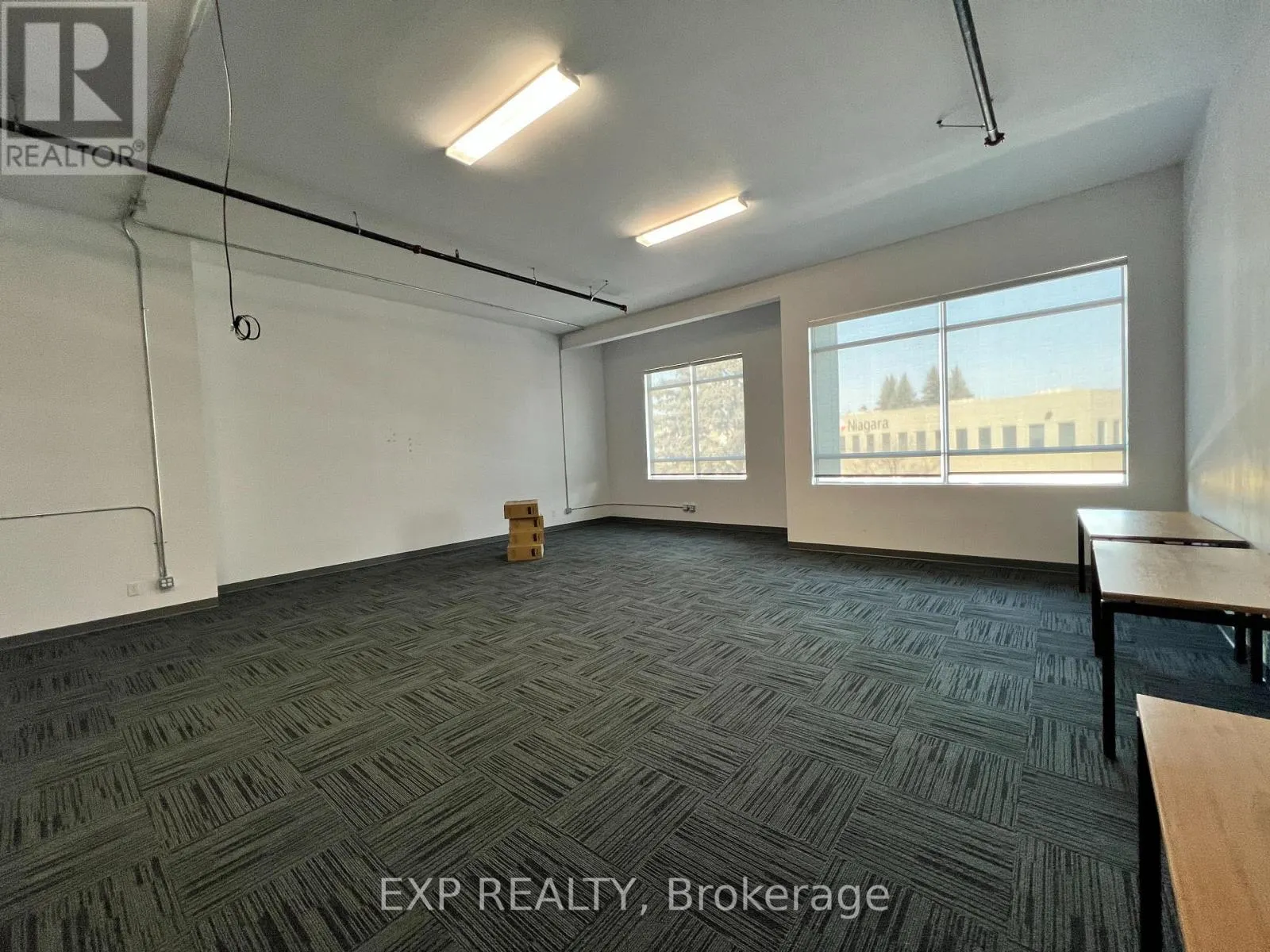 203 - 65 DENZIL DOYLE COURT