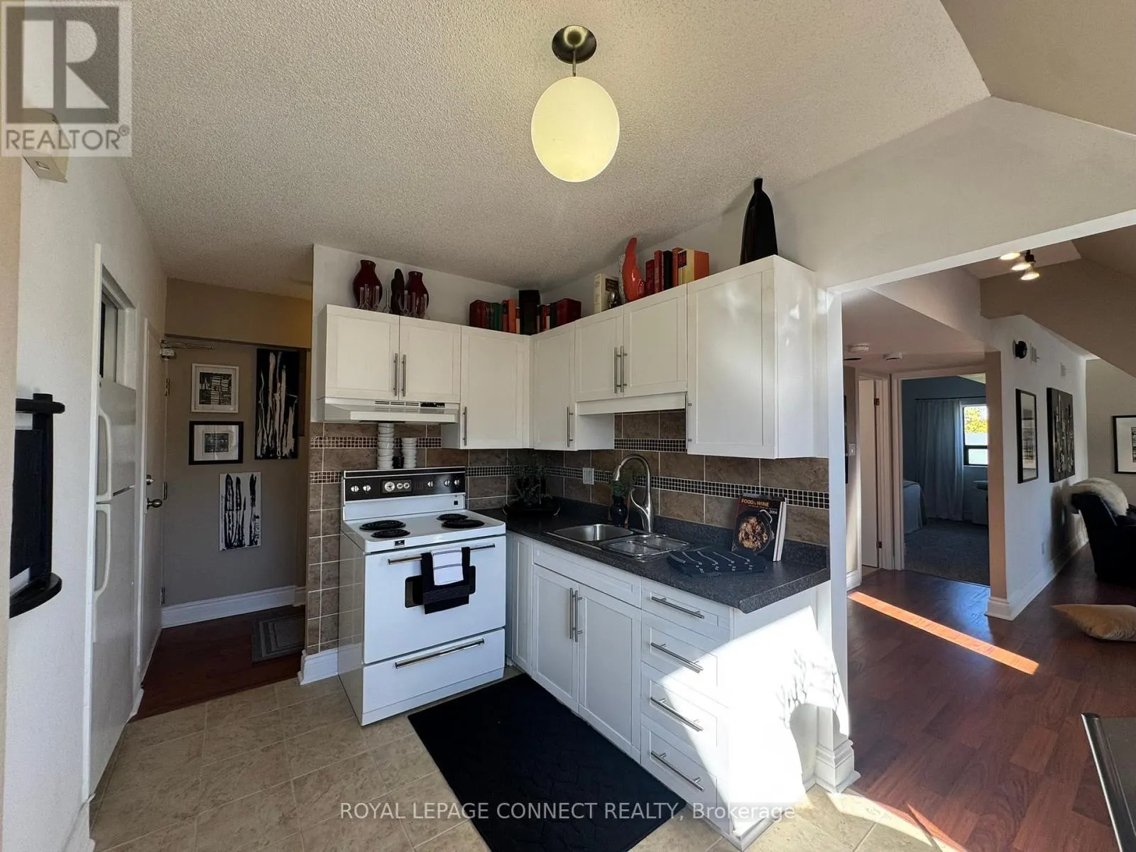 303 - 4872 VALLEY WAY