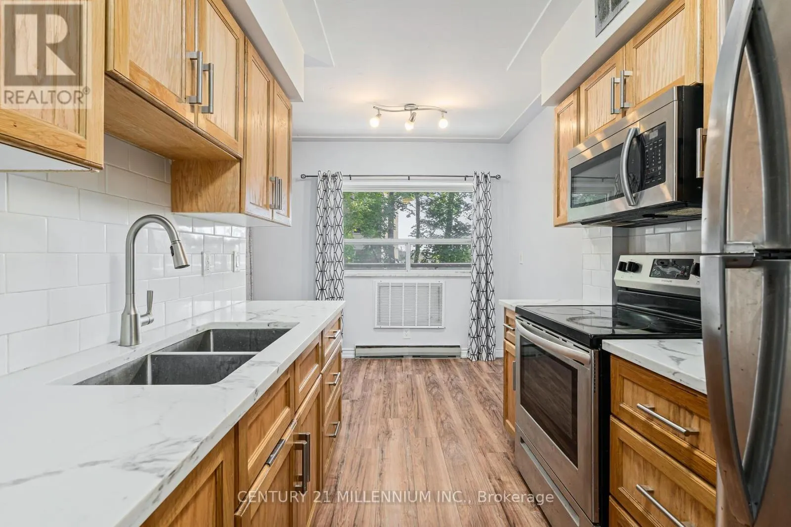 203 - 11 WOODMAN DRIVE