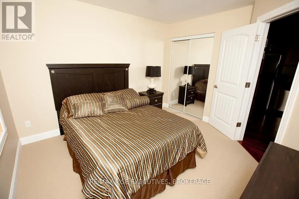 210 - 810 BLACKBURN MEWS, #210