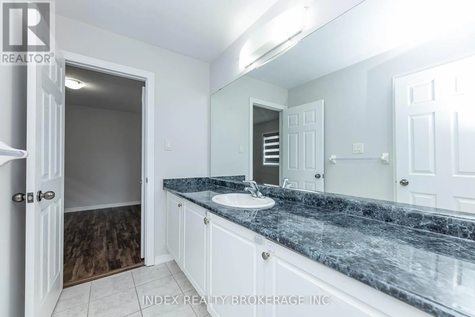 7713 BLACK MAPLE DRIVE