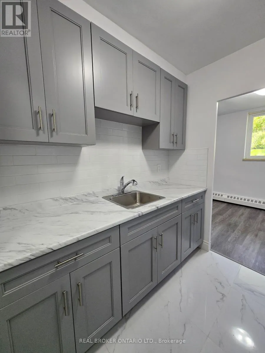 APT # 102 - 11 WELLINGTON RD 124