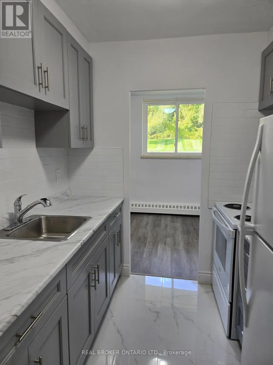 APT # 102 - 11 WELLINGTON RD 124