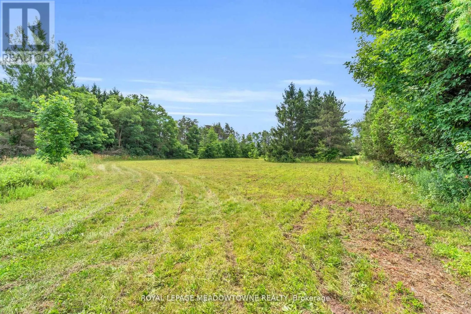 9483 WELLINGTON RD 124 ROAD