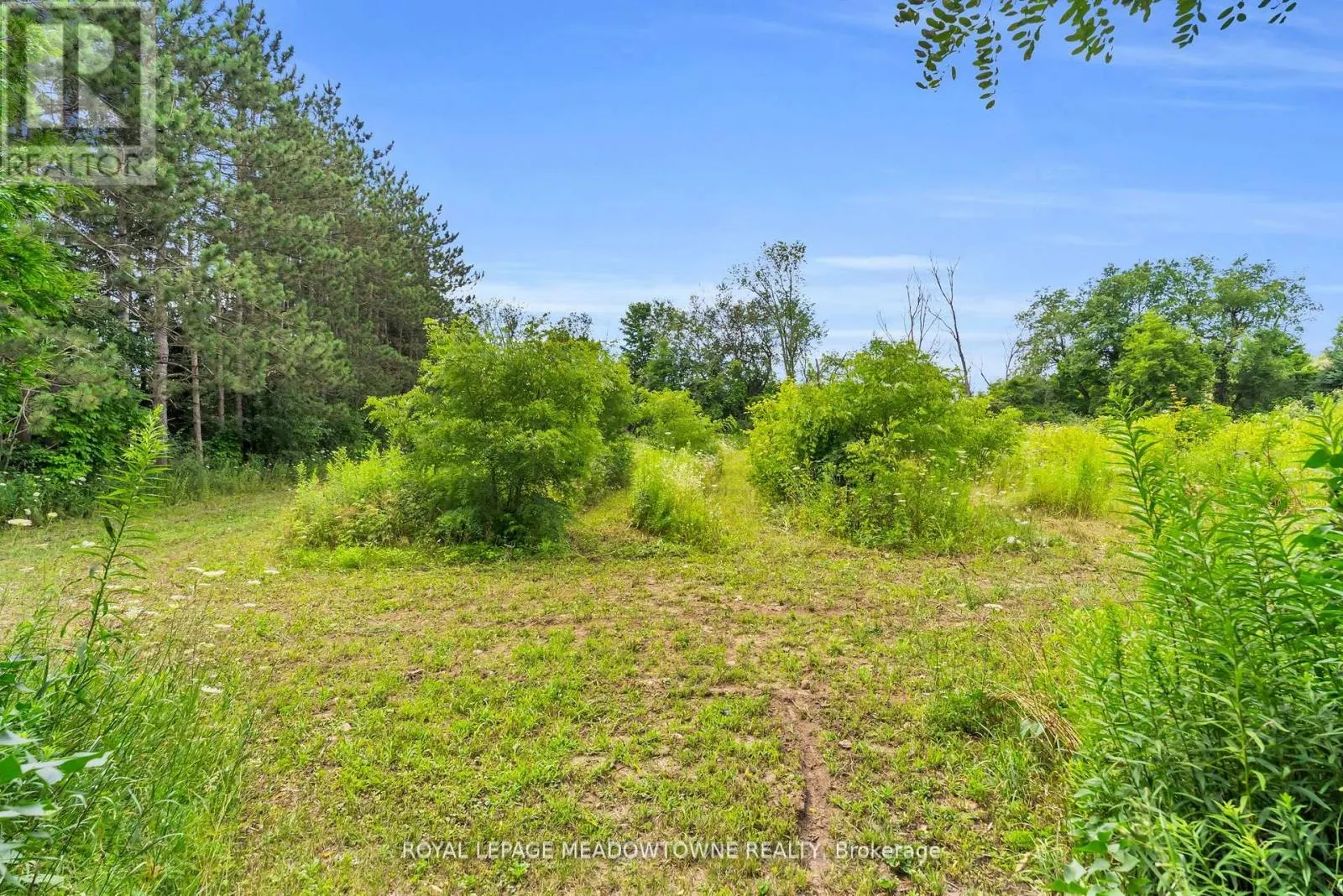 9483 WELLINGTON RD 124 ROAD