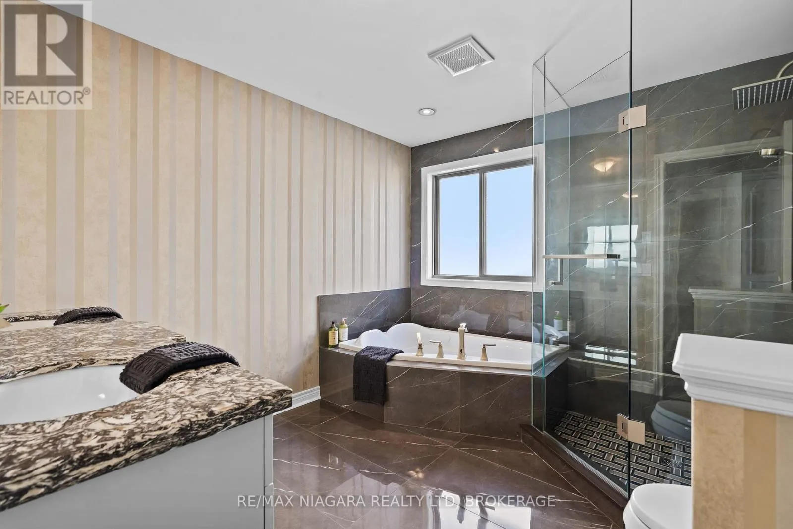 6877 COURTNEY CRESCENT