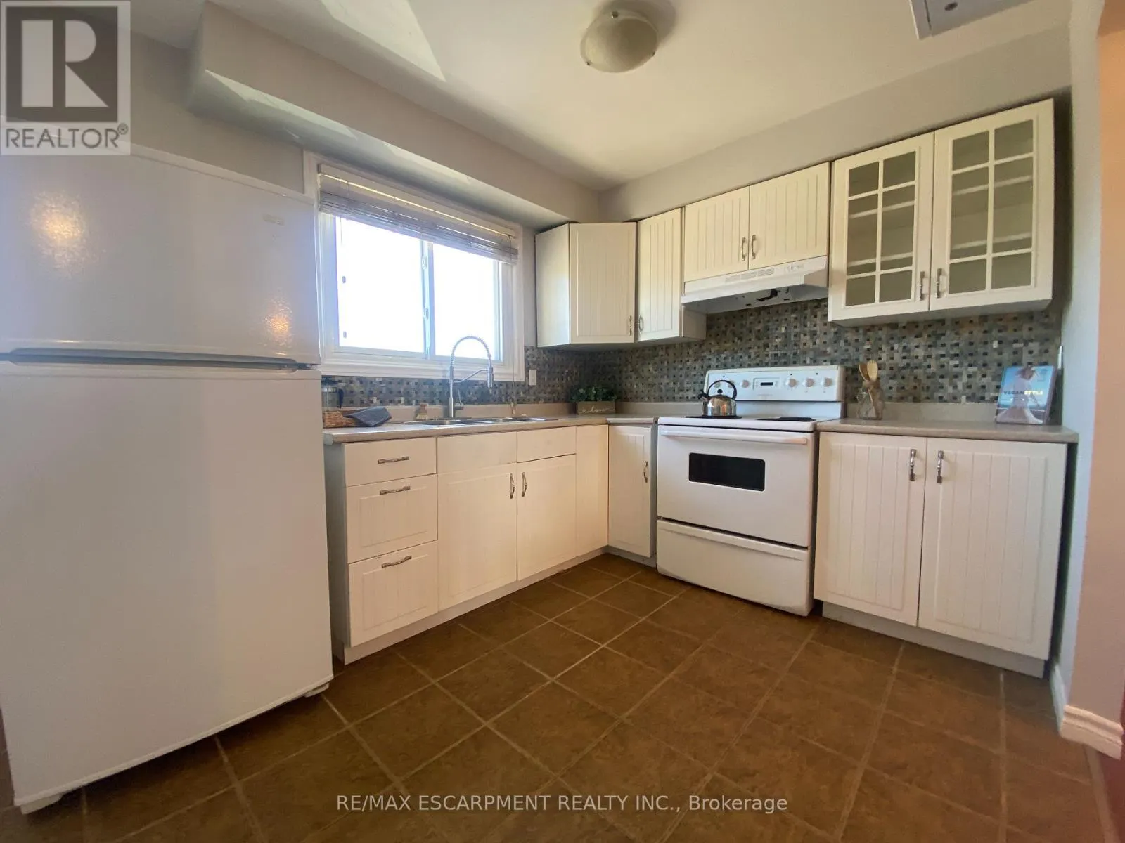 3 - 1025 UPPER GAGE AVENUE