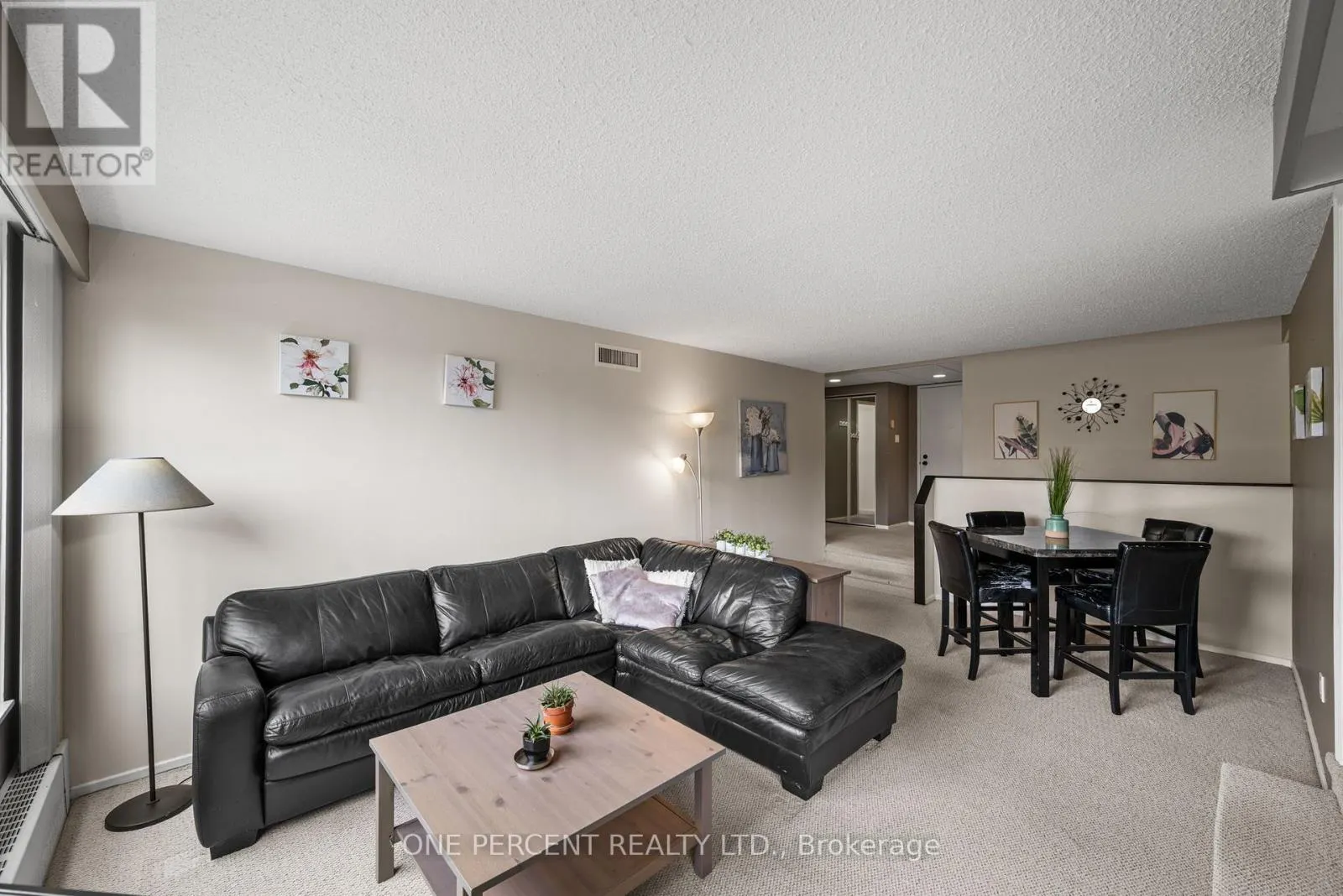 201 - 373 LAURIER AVENUE E