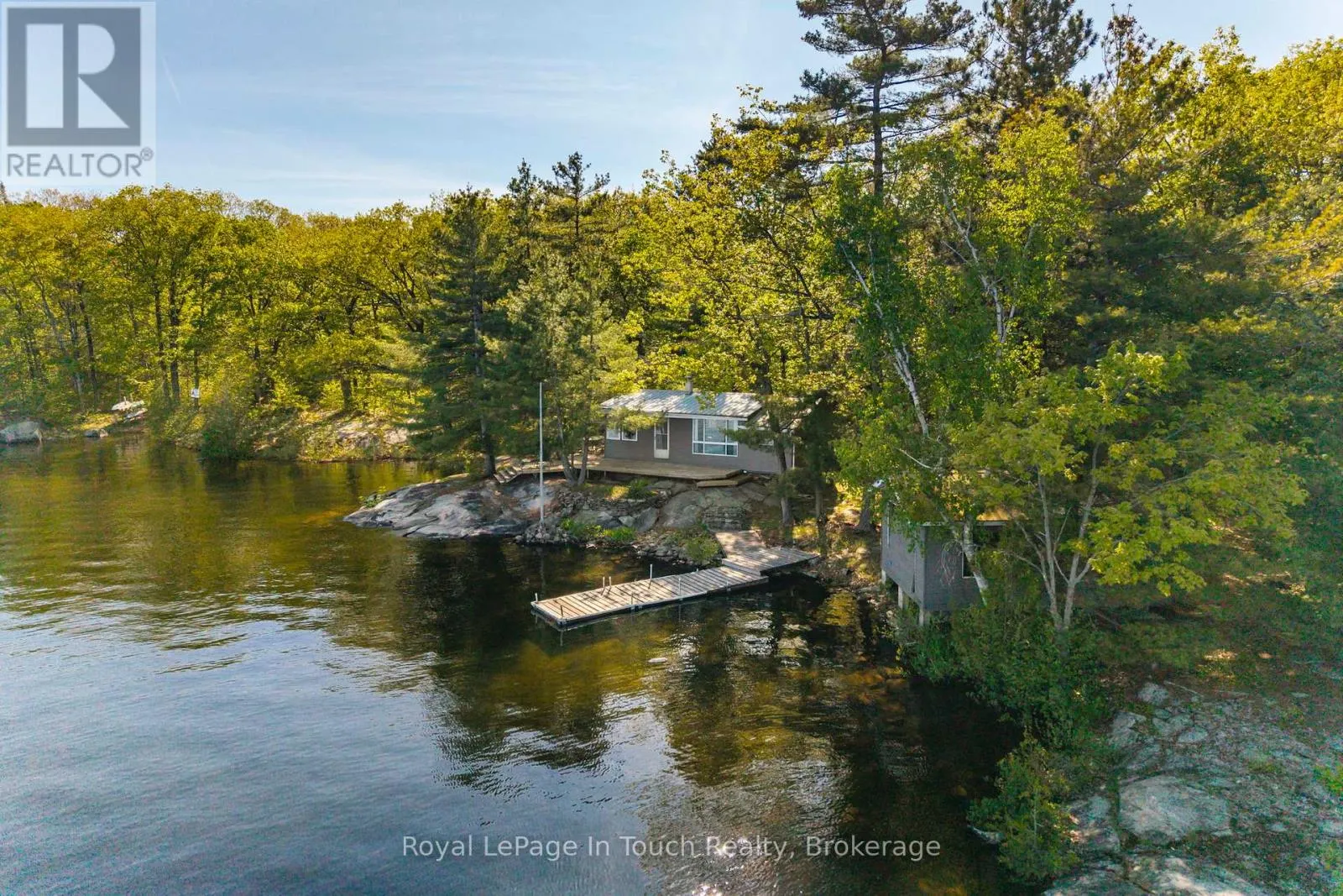1916 SIX MILE LAKE SHORE ISLAND