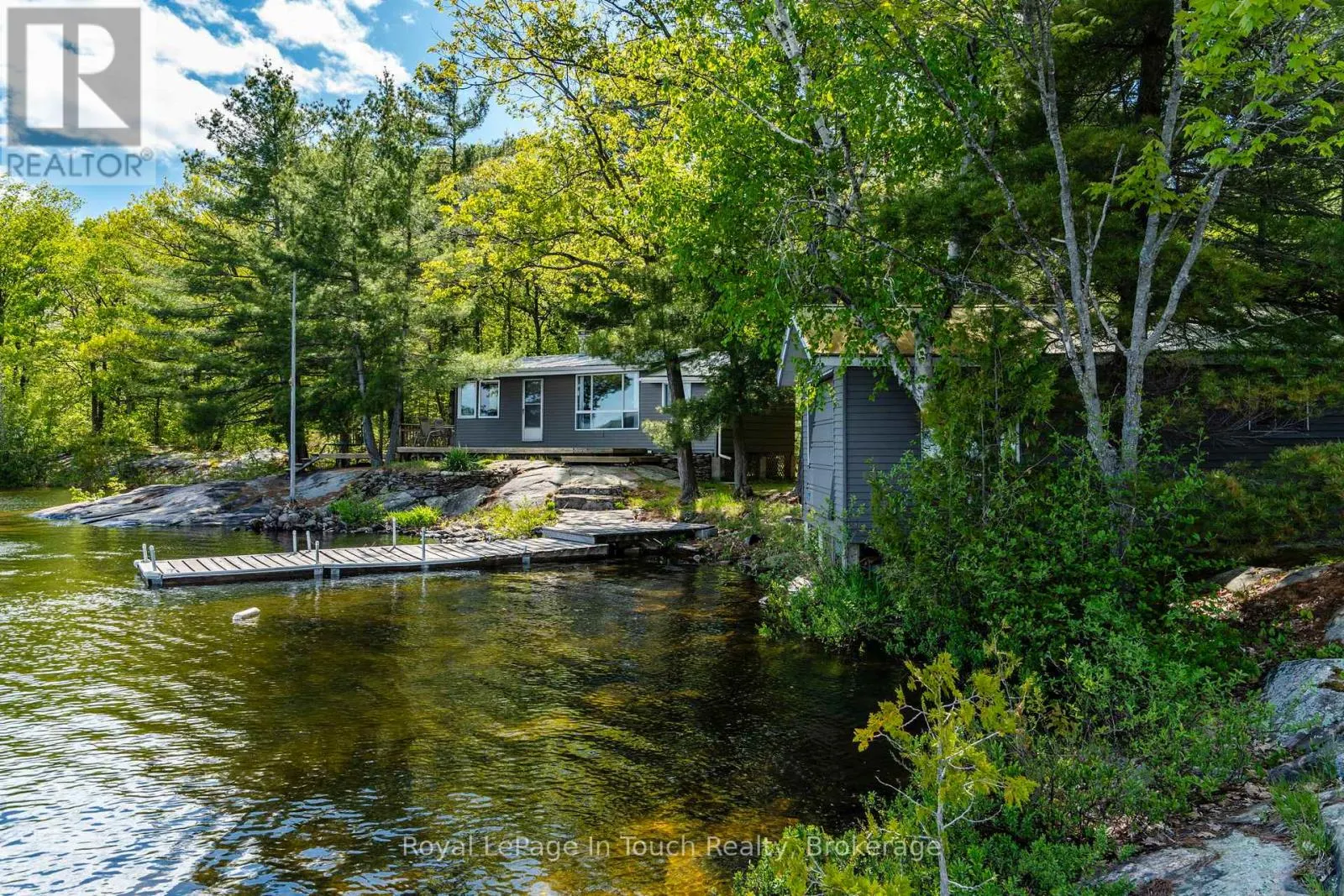 1916 SIX MILE LAKE SHORE ISLAND