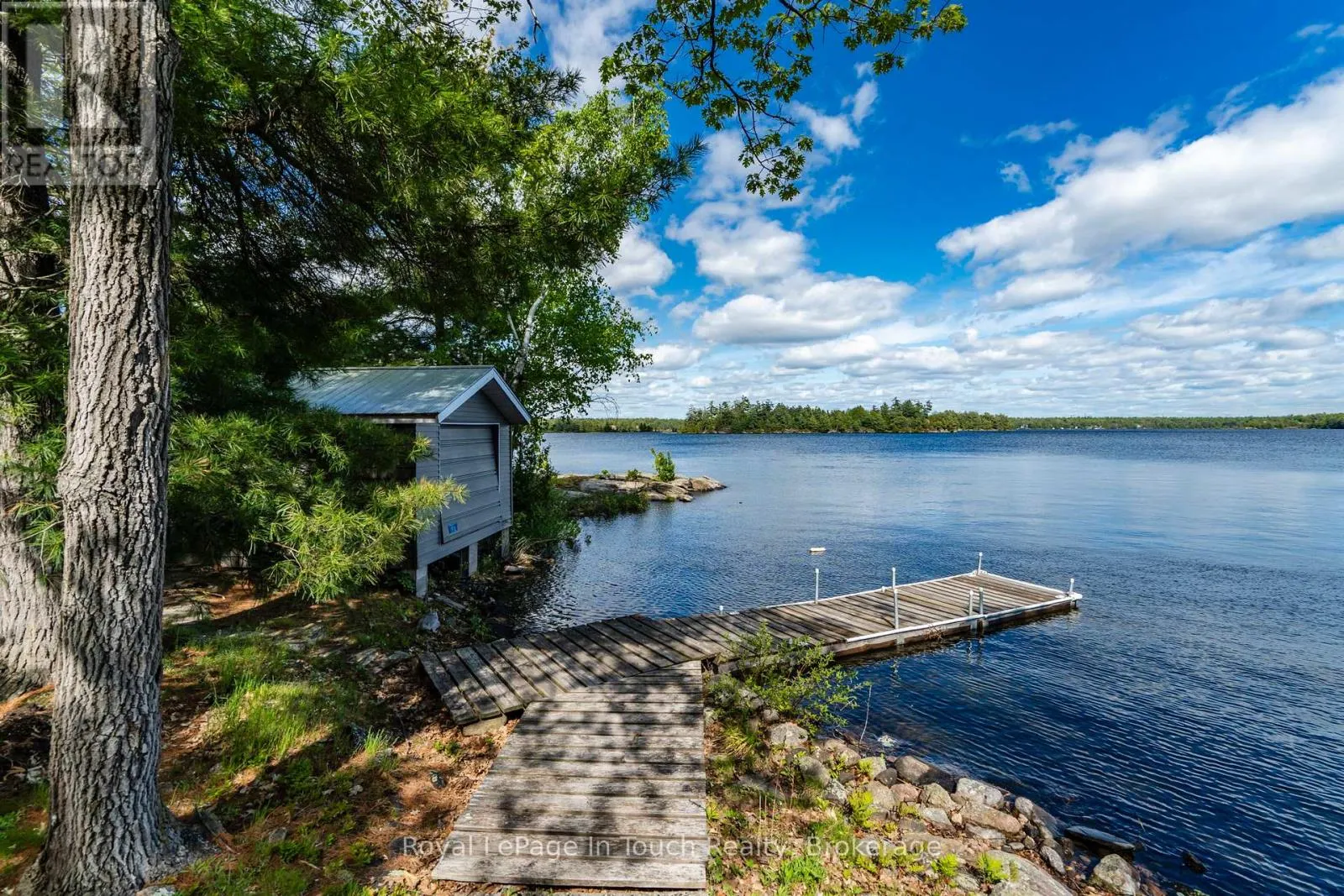 1916 SIX MILE LAKE SHORE ISLAND