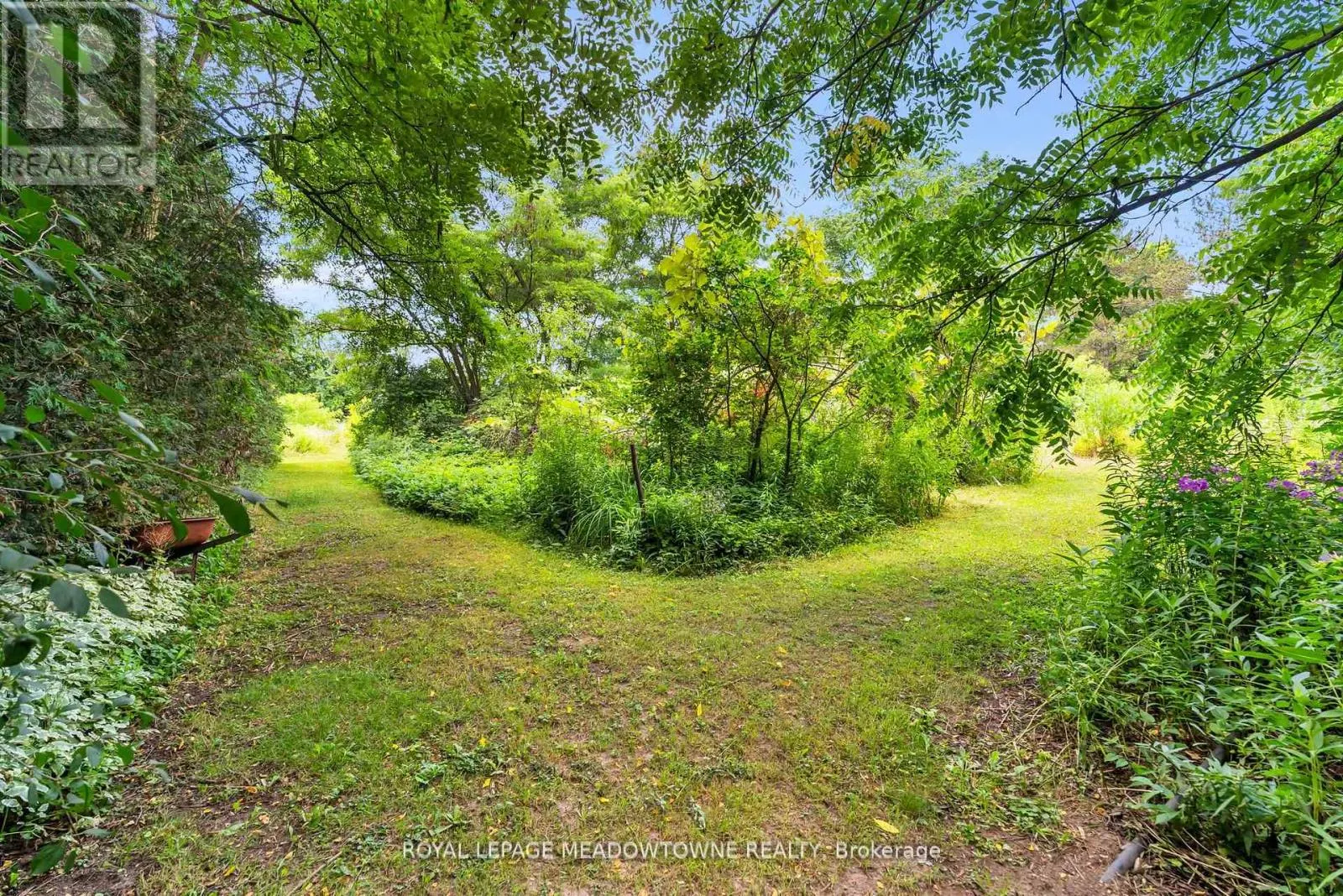 9483 WELLINGTON RD 124 ROAD