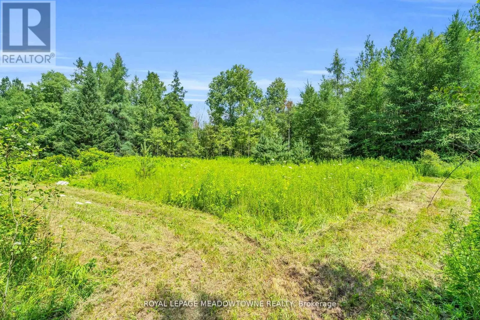 9483 WELLINGTON RD 124 ROAD