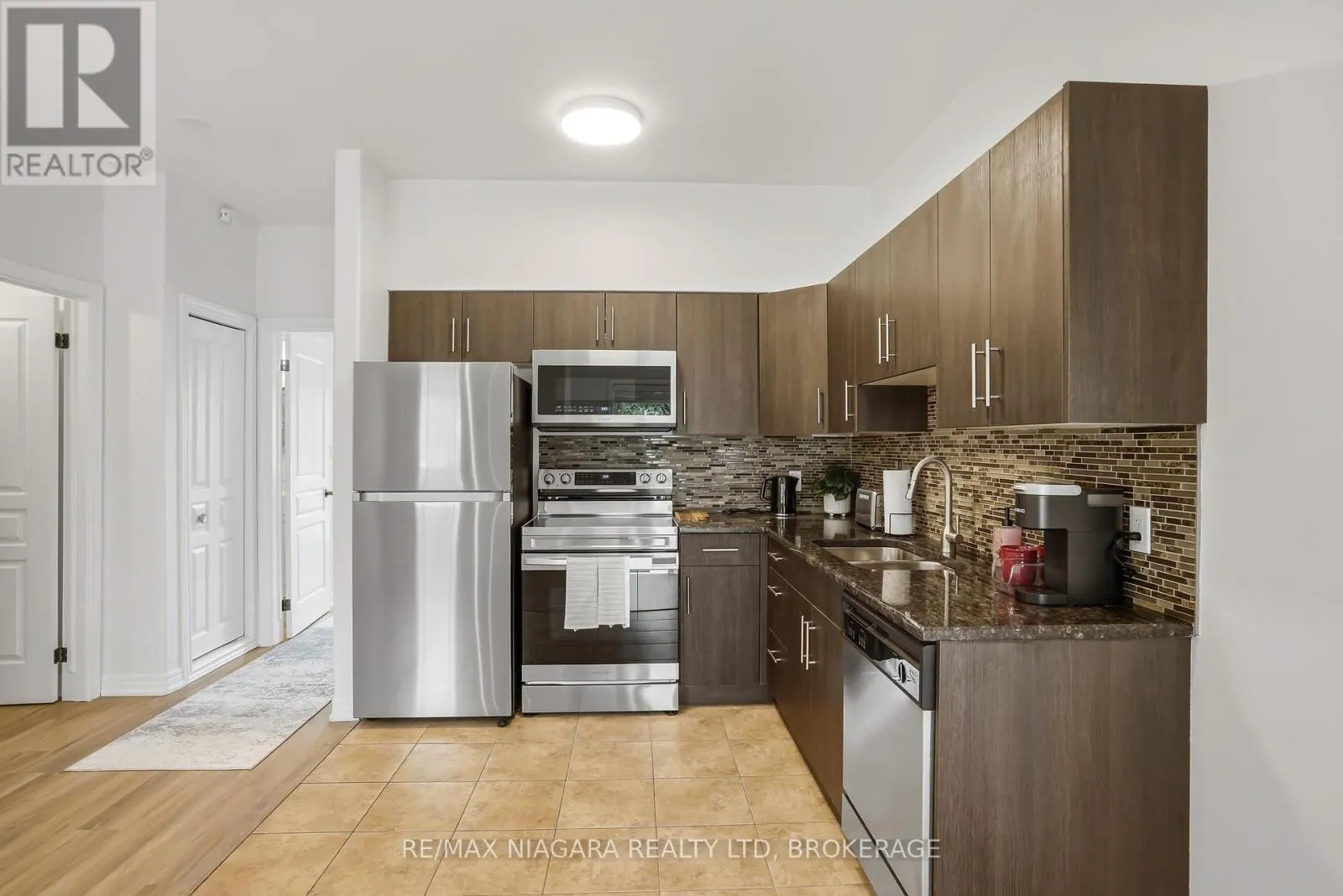 104 - 6045 DUNN STREET #104