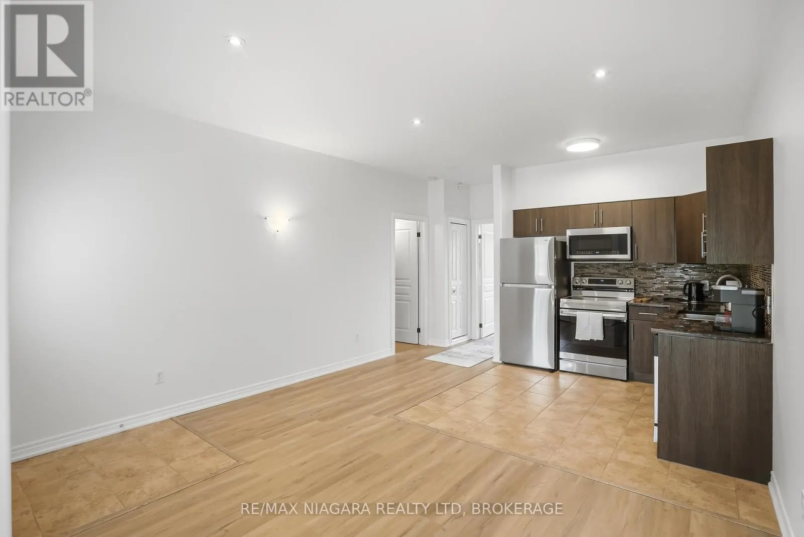 104 - 6045 DUNN STREET #104